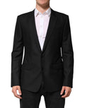 Veste blazer en laine noire de Dolce & Gabbana, coupe simple boutonnage, élégante et classique pour hommes.