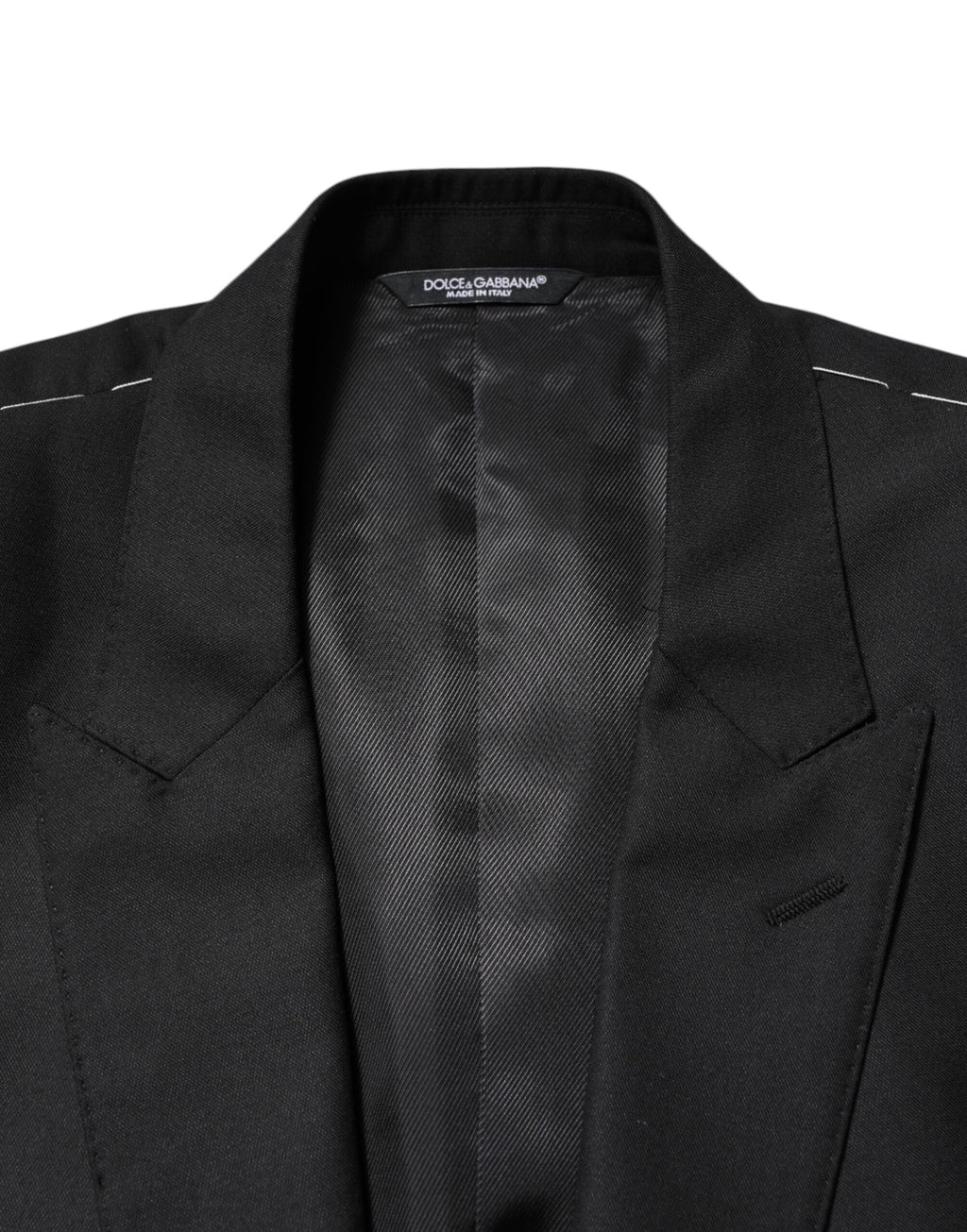 Veste blazer en laine noire Dolce & Gabbana à simple boutonnage, élégante et ajustée, vue de face sur fond neutre.