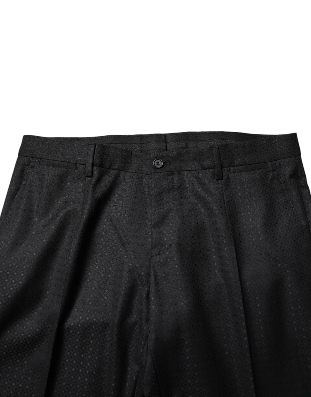 Costume deux pièces en jacquard noir de Dolce & Gabbana, veste croisée à un bouton et pantalon assorti.