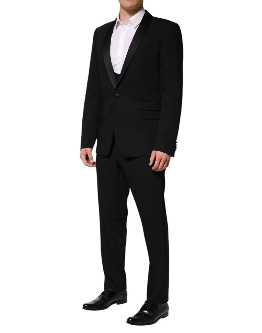 Costume trois pièces en laine noire de Dolce & Gabbana, veste à fermeture simple et pantalon assorti.