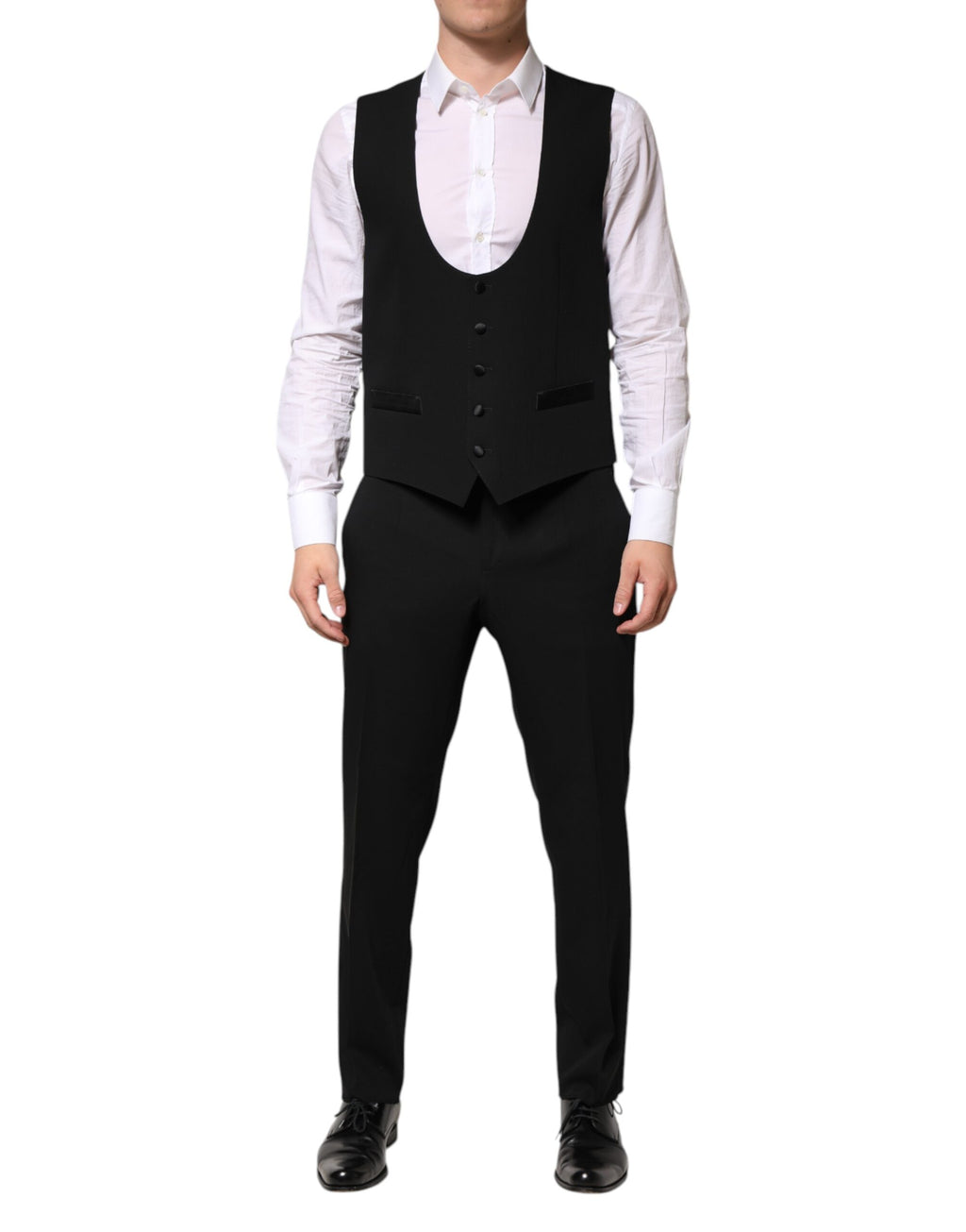Costume noir en laine Dolce & Gabbana à trois pièces, veste à simple boutonnage, pantalon et gilet élégants.