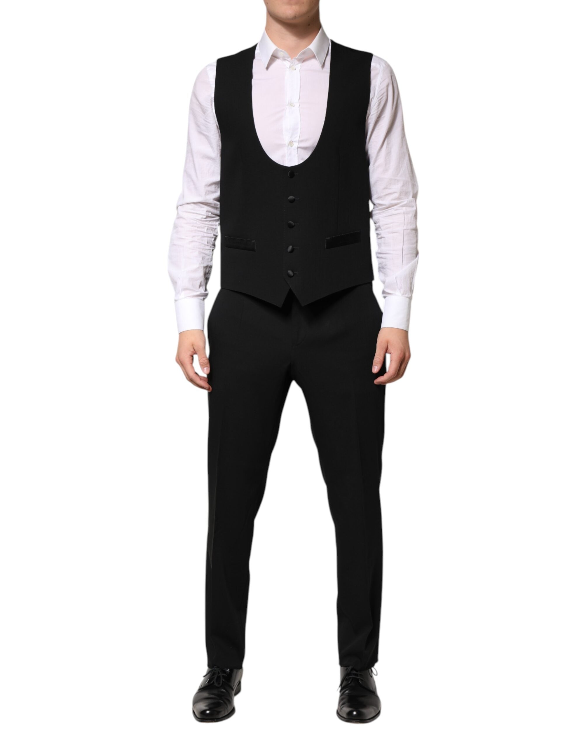 Costume noir en laine Dolce & Gabbana à trois pièces, veste à simple boutonnage, pantalon et gilet élégants.