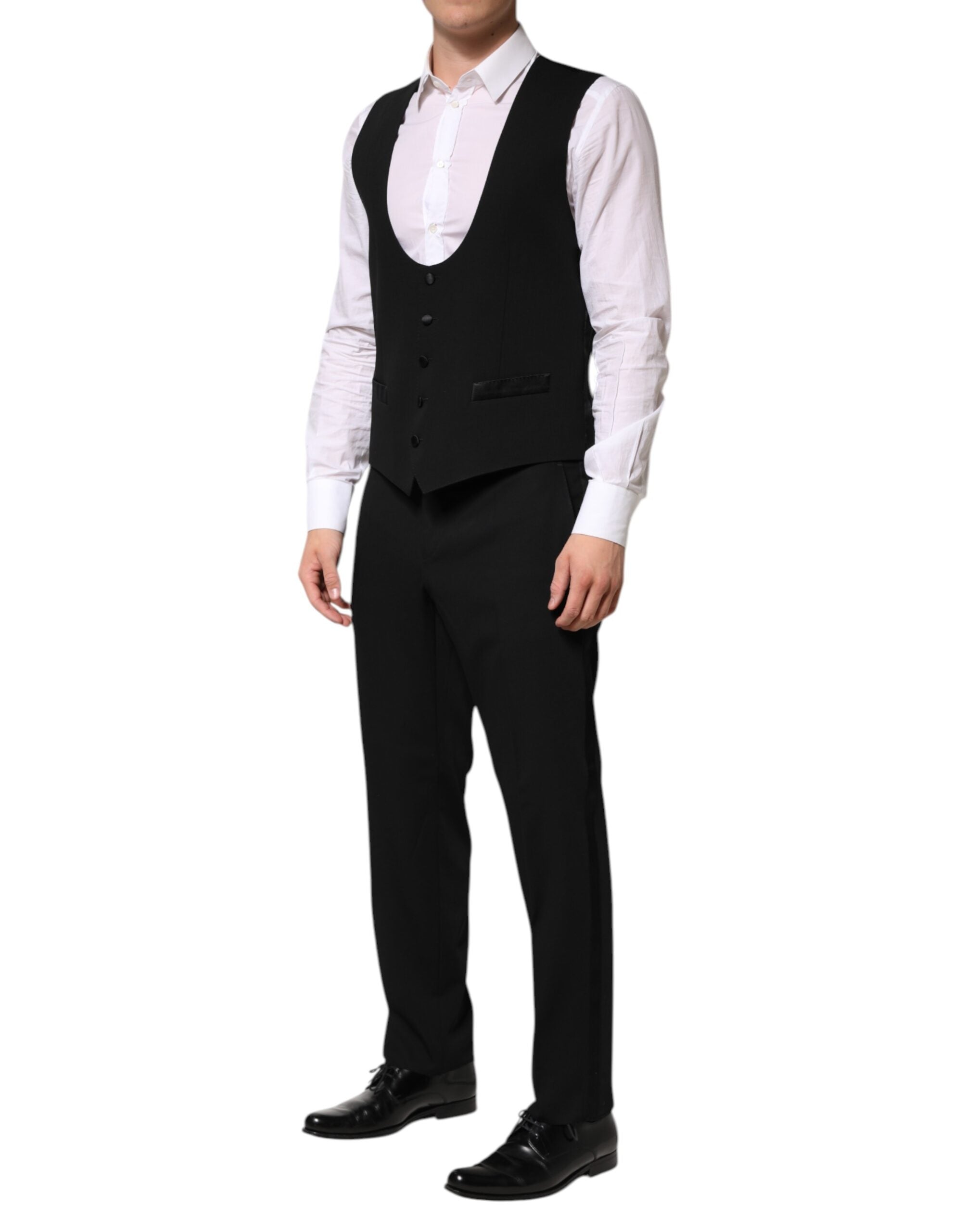 Costume trois pièces Dolce & Gabbana en laine noire, veste croisée à un bouton, pantalon et gilet assortis.