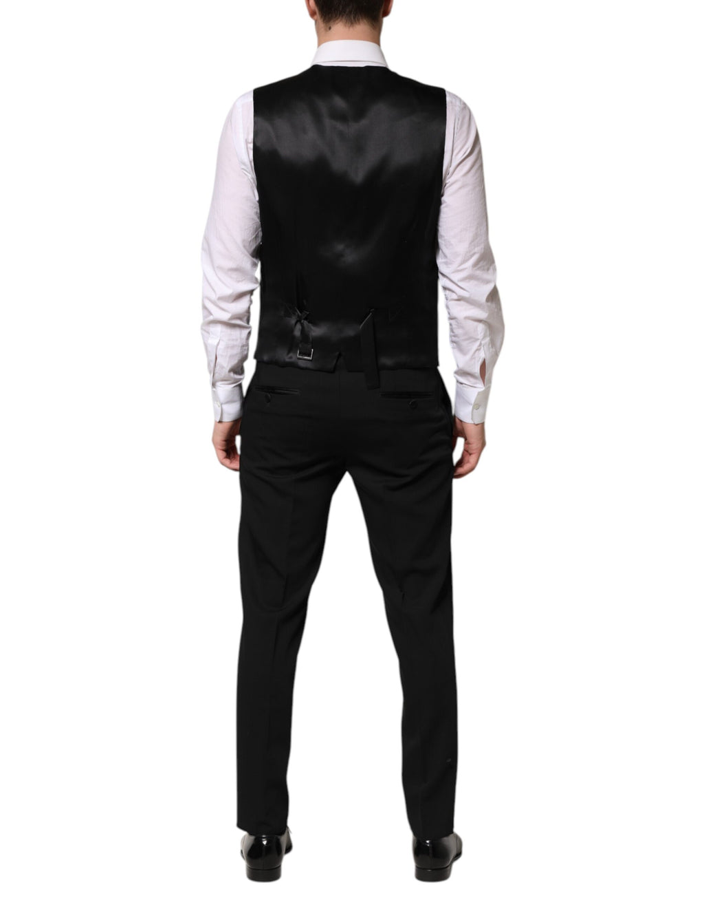 Costume trois pièces en laine noire Dolce & Gabbana, veste à un bouton, pantalon et gilet élégants, mode masculine sophistiquée.