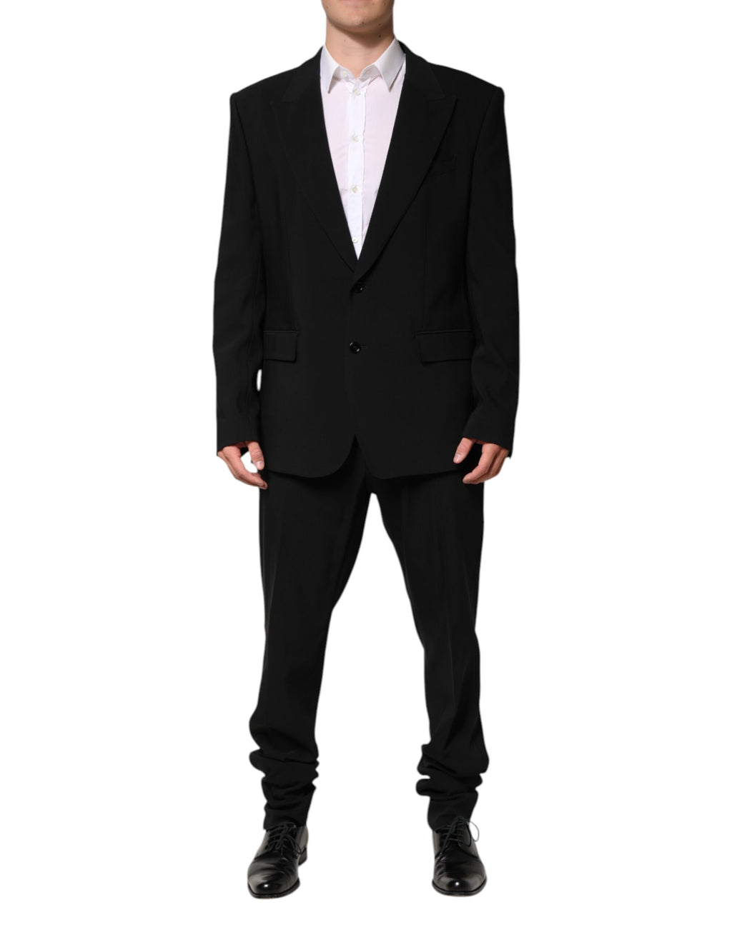 Costume noir en coton Dolce & Gabbana à deux pièces avec veste croisée simple, élégance masculine.