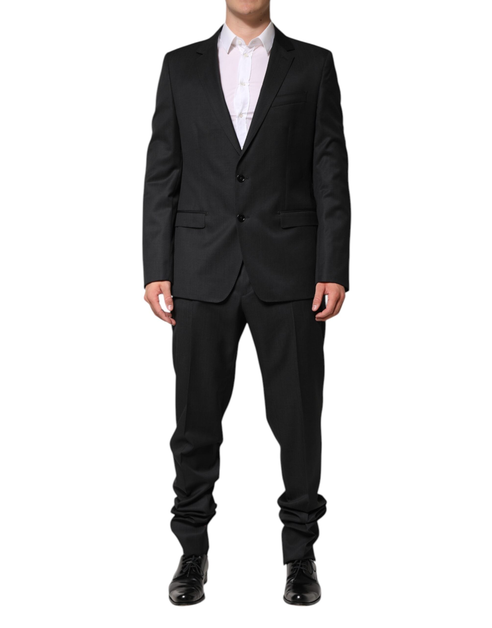 Costume deux pièces en laine gris foncé Dolce & Gabbana, veste croisée à un bouton et pantalon assorti, élégant et sophistiqué.