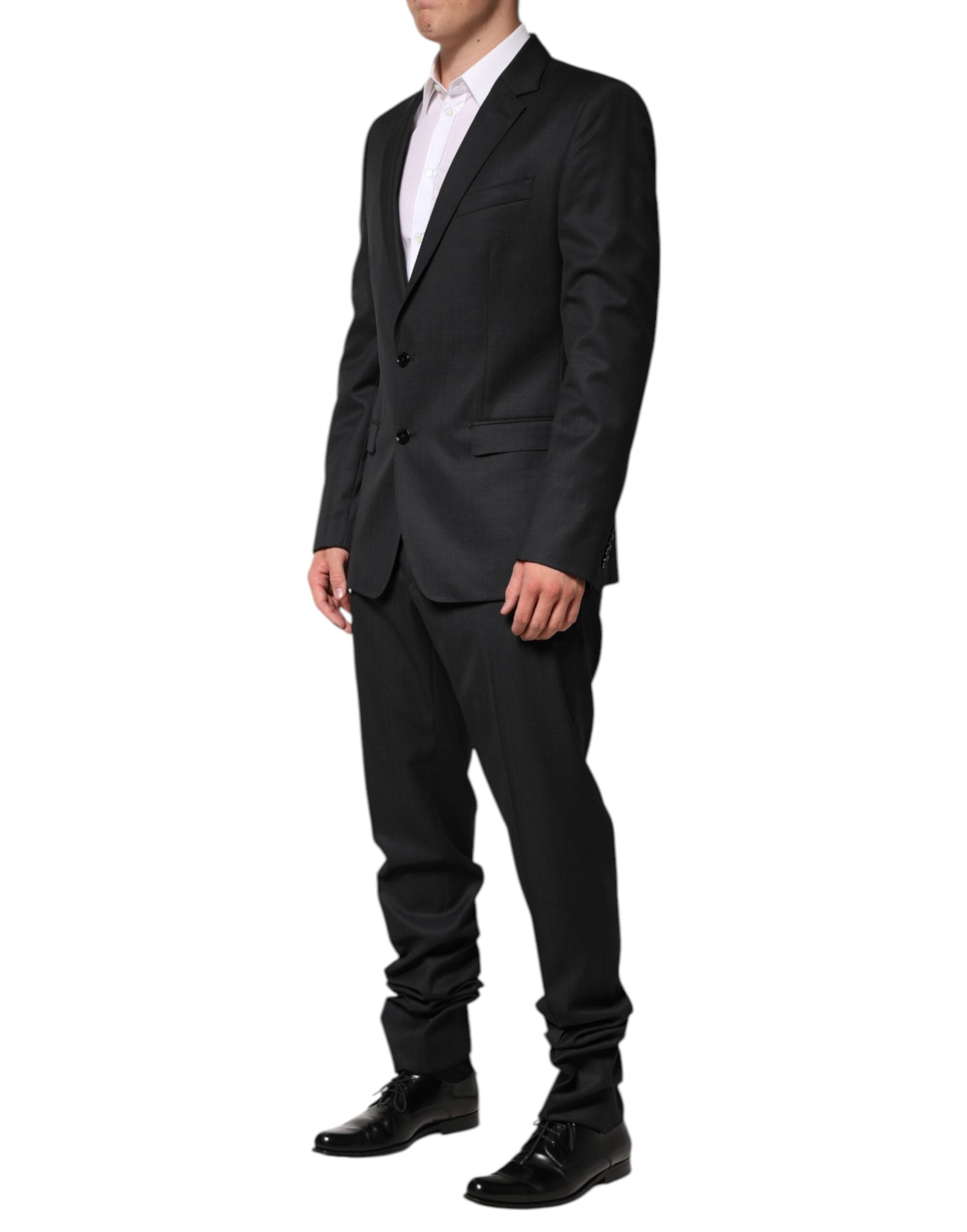 Costume homme Dolce & Gabbana en laine gris foncé, deux pièces, à boutonnière simple, vue de face.