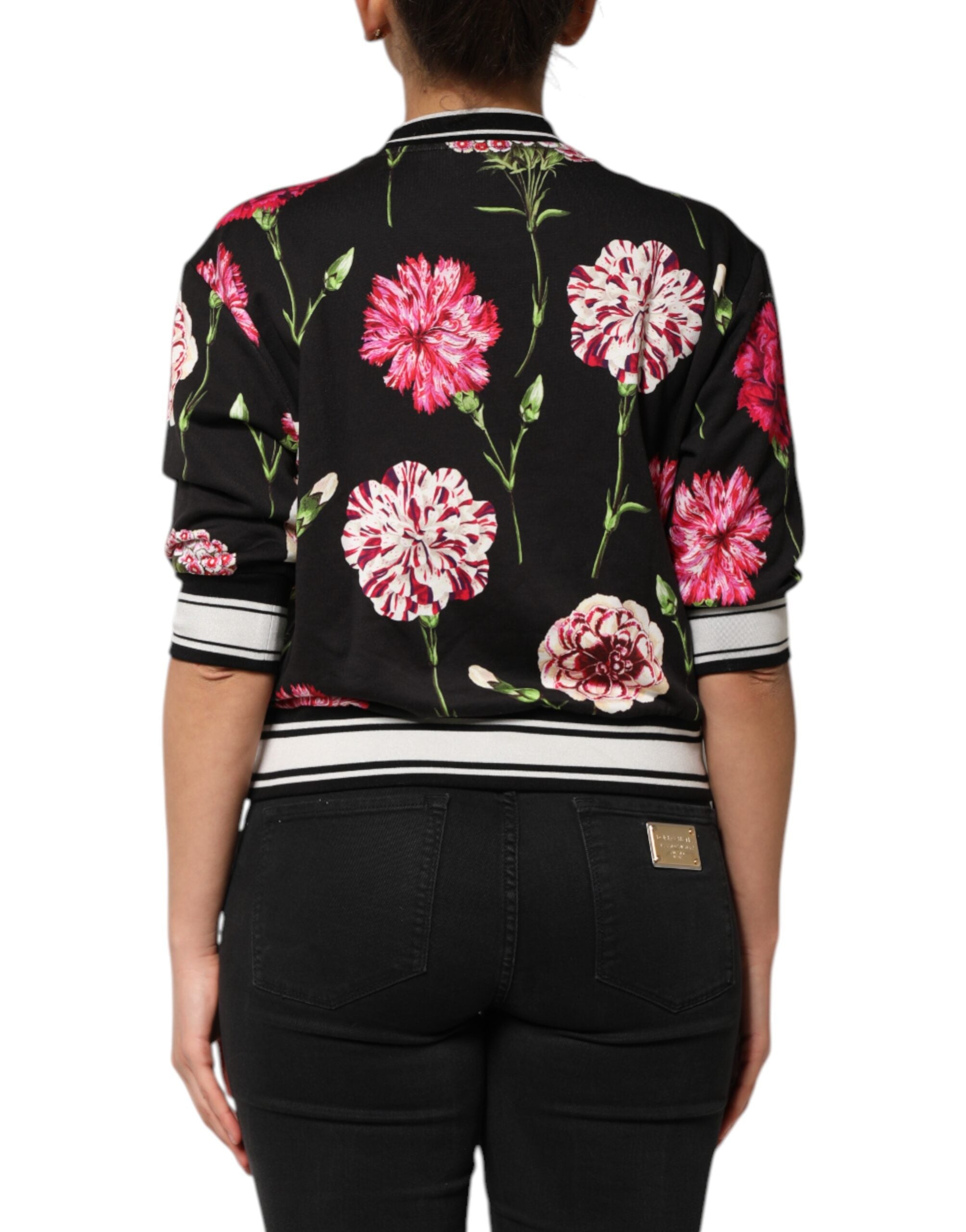 Haut en coton noir à fleurs Dolce & Gabbana avec manches courtes, motif floral élégant et détails raffinés.