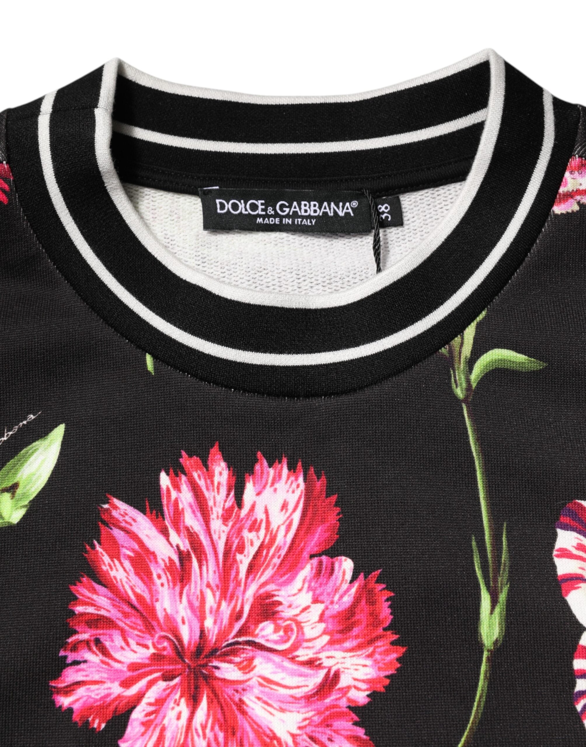 T-shirt à manches courtes en coton noir avec imprimé floral Dolce & Gabbana, visible en gros plan.