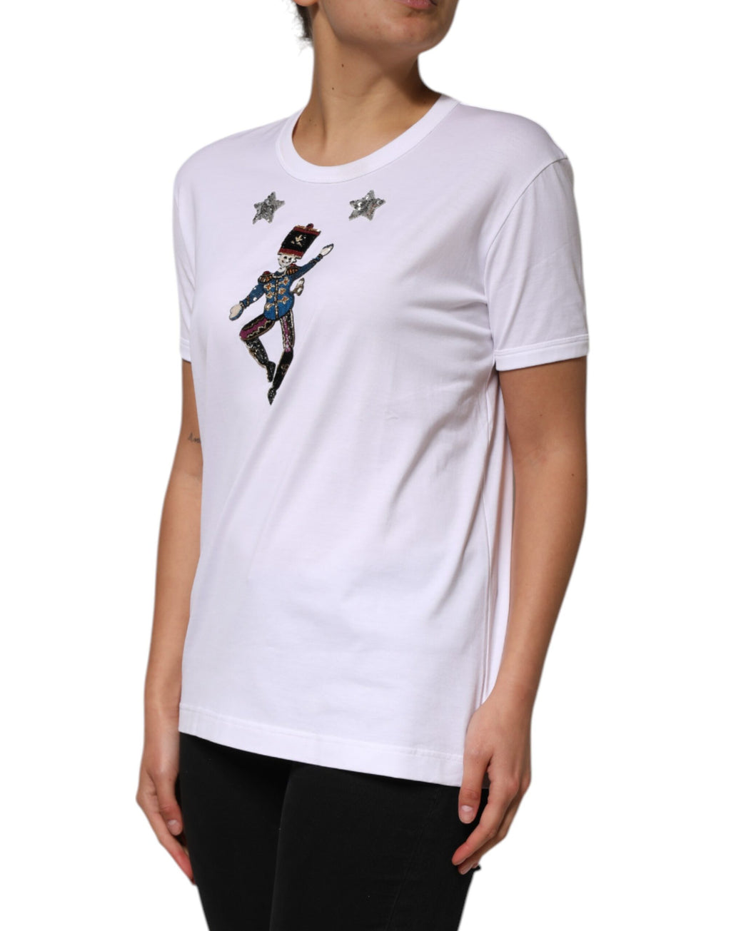 T-shirt blanc Dolce & Gabbana en coton avec sequins et embellissements, visible en gros plan.