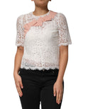Blouse Dolce & Gabbana en dentelle blanche à manches courtes avec motif floral, élégante et légère pour femme.