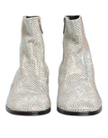 Escarpins blancs Dolce & Gabbana avec logo DG en strass et semelle à talon pour femme.