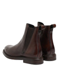 Bottes en cuir marron Chelsea Dolce & Gabbana, mi-mollet, style élégant avec semelle robuste et design sophistiqué.