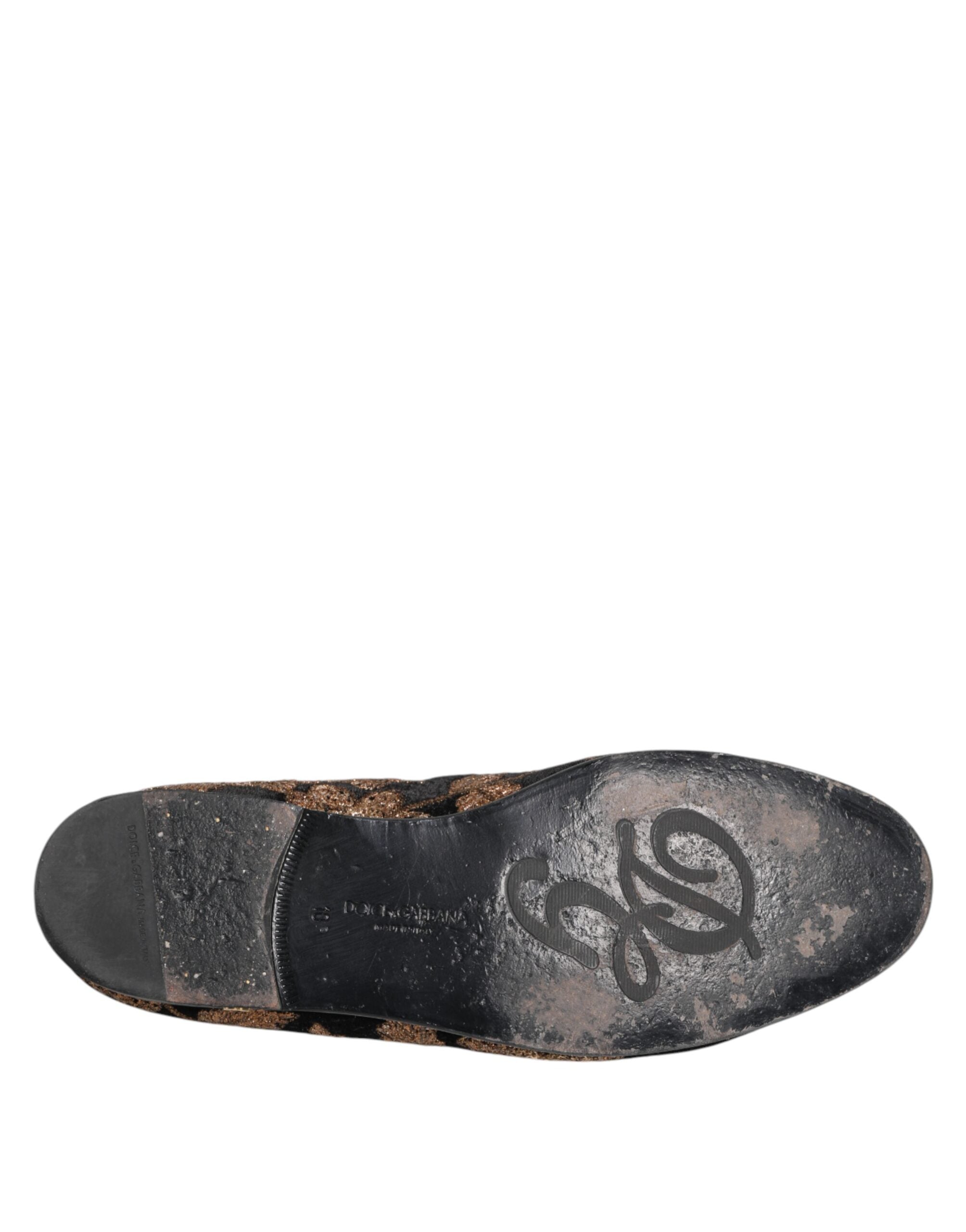 Chaussures mocassins pour hommes Dolce & Gabbana noires avec broderie florale élégante, finition en cuir et détails sophistiqués.