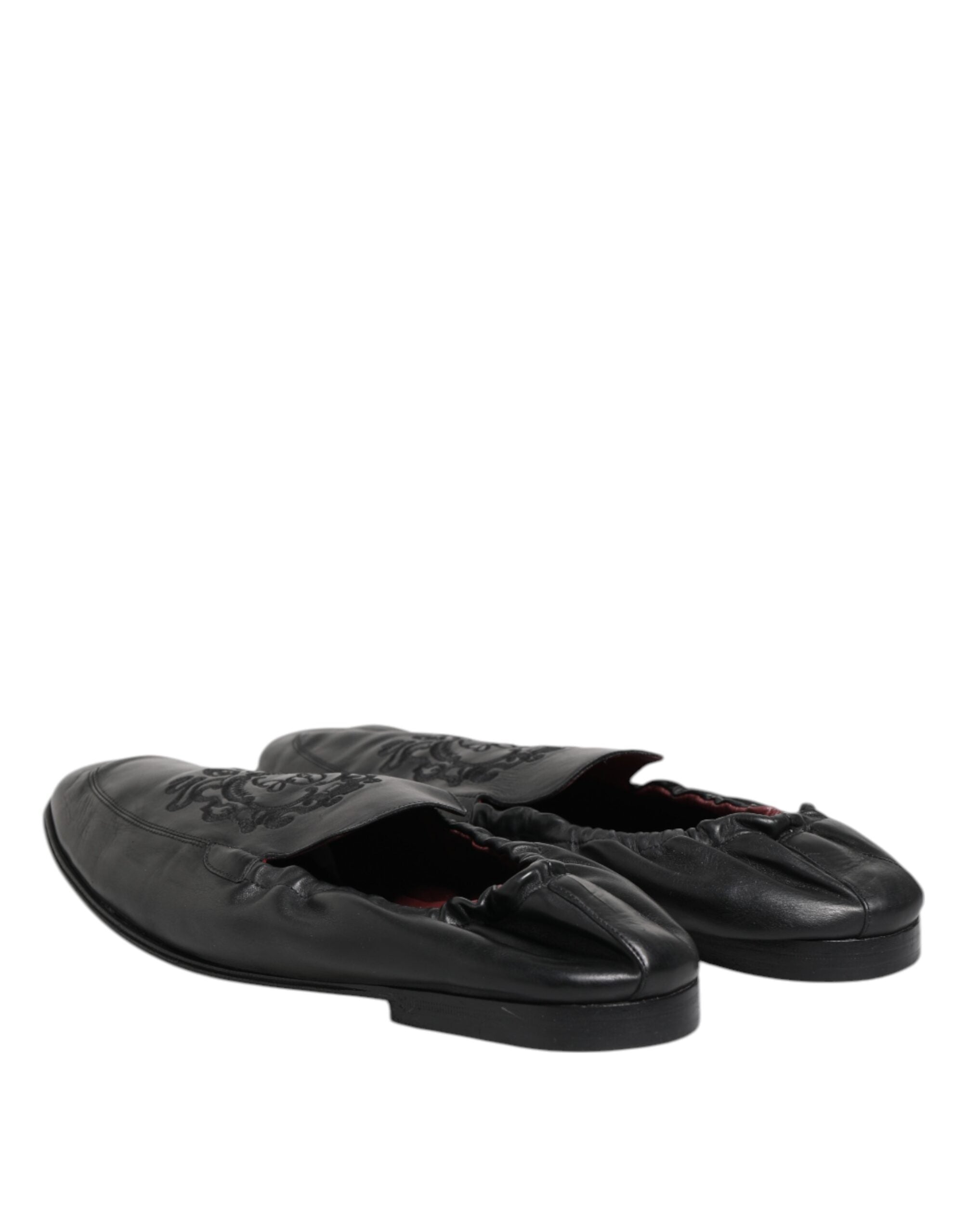 Chaussures mocassins Dolce & Gabbana en cuir noir pour homme, chaussons plats slip-on élégants et confortables.