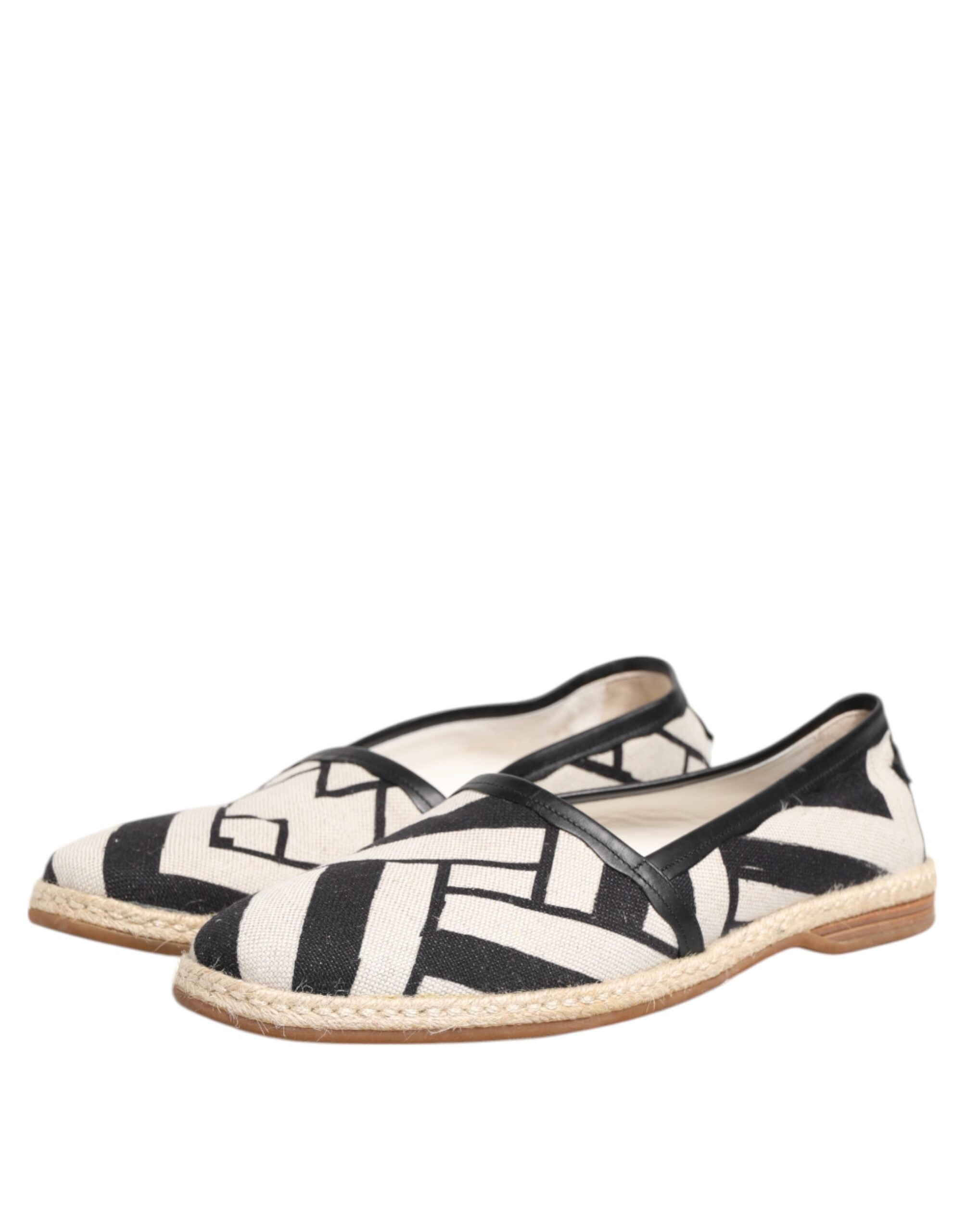 Chaussures espadrilles plates Dolce & Gabbana à rayures noires et blanches, vue de face, en toile avec semelle en corde.