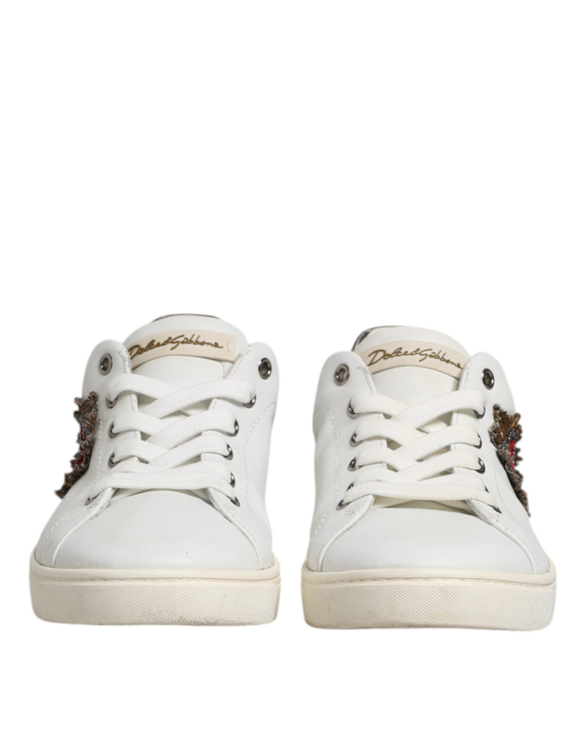 Chaussures pour hommes Dolce & Gabbana, baskets blanches en cuir avec cœur sacré argenté, style élégant et moderne.