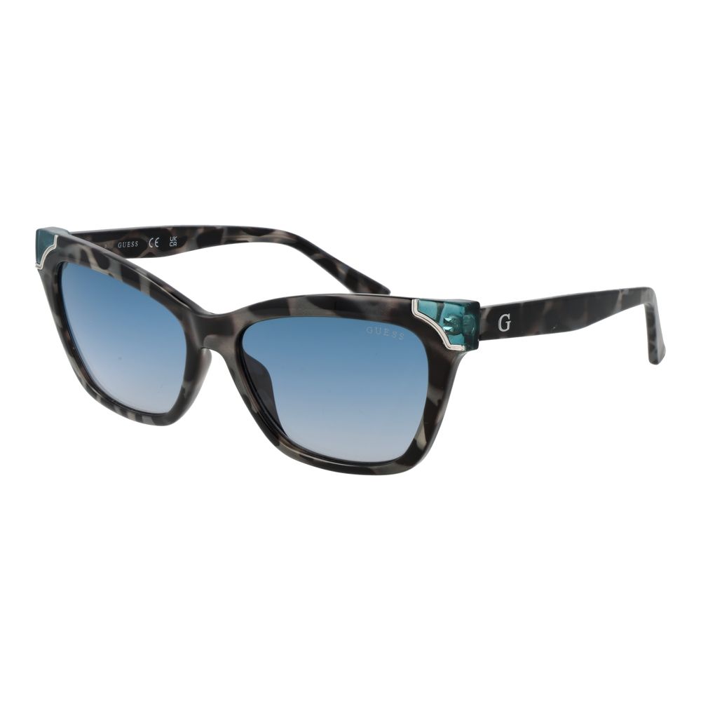 Lunettes de soleil multicolores en acier inoxydable de la marque Guess, avec monture tendance et design moderne.