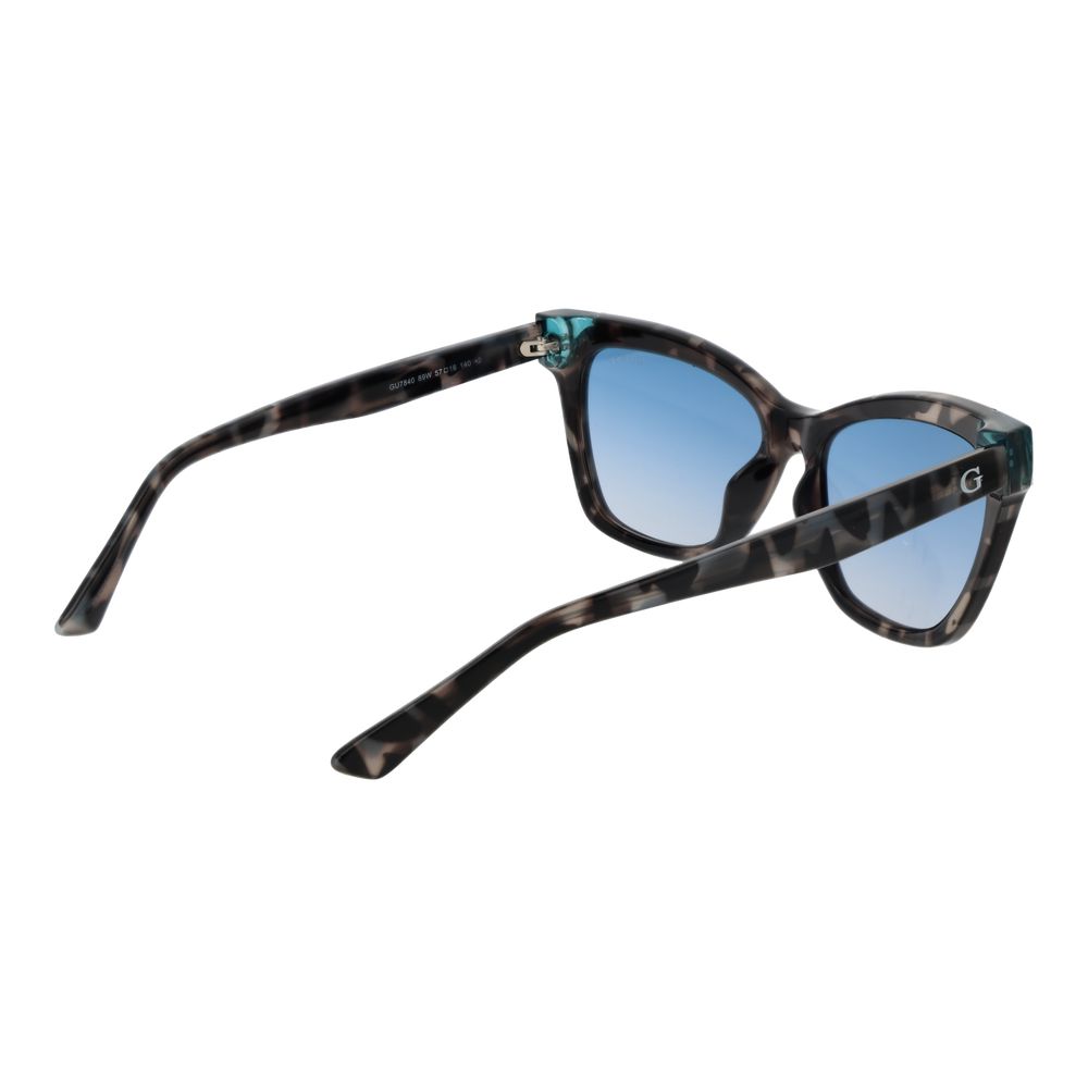 Lunettes de soleil Guess multicolores en acier inoxydable avec monture tendance et verres élégants.