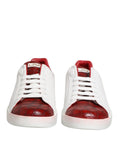 Chaussures sneakers en cuir blanc et rouge Dolce & Gabbana avec lacets, vue de face, en gros plan
