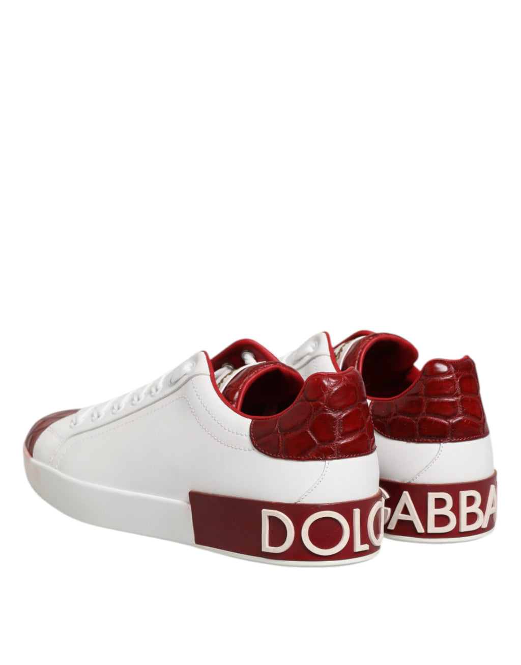 Chaussures sneakers blanches et rouges en cuir Dolce & Gabbana avec lacets, vue de côté.