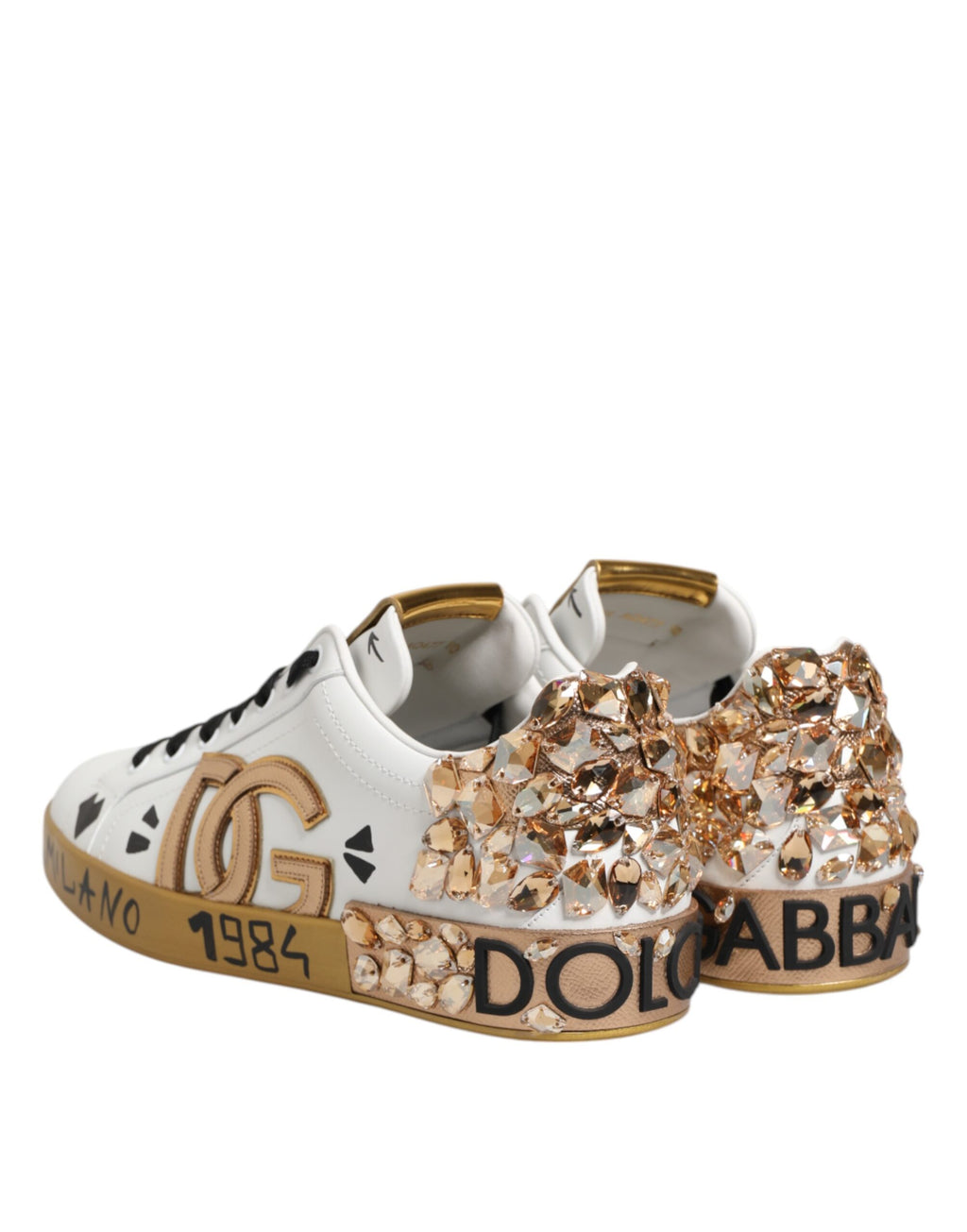 Chaussures Portofino blanches en or blanc et cristaux Dolce & Gabbana, sneakers élégants en cuir avec détails brillants.