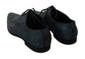Chaussures en cuir de python bleu de Dolce & Gabbana, élégantes et sophistiquées, avec motif serpent visible.