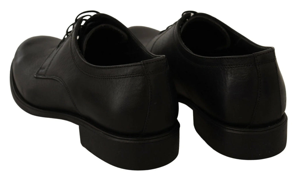 Chaussures derby en cuir noir Dolce & Gabbana pour homme, avec laçage élégant et finition sophistiquée.