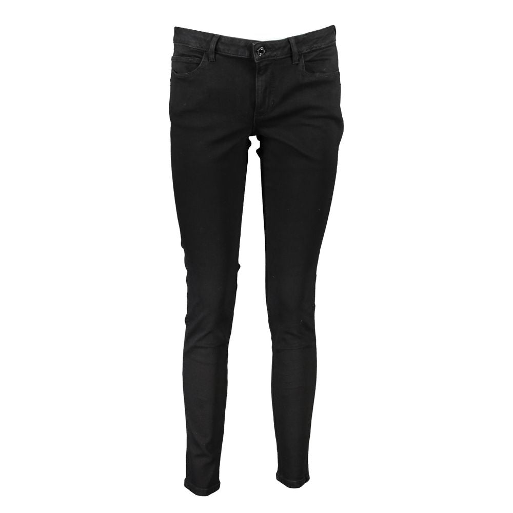 Jeans skinny noirs en coton pour femmes de Guess Jeans, coupe ajustée et moderne, visible sur l'image.