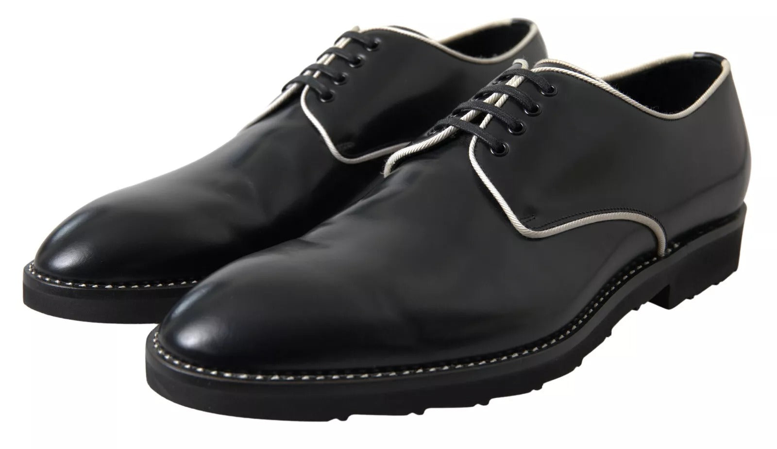 Chaussures formelles en cuir noir et blanc de Dolce & Gabbana, élégantes et sophistiquées pour homme.