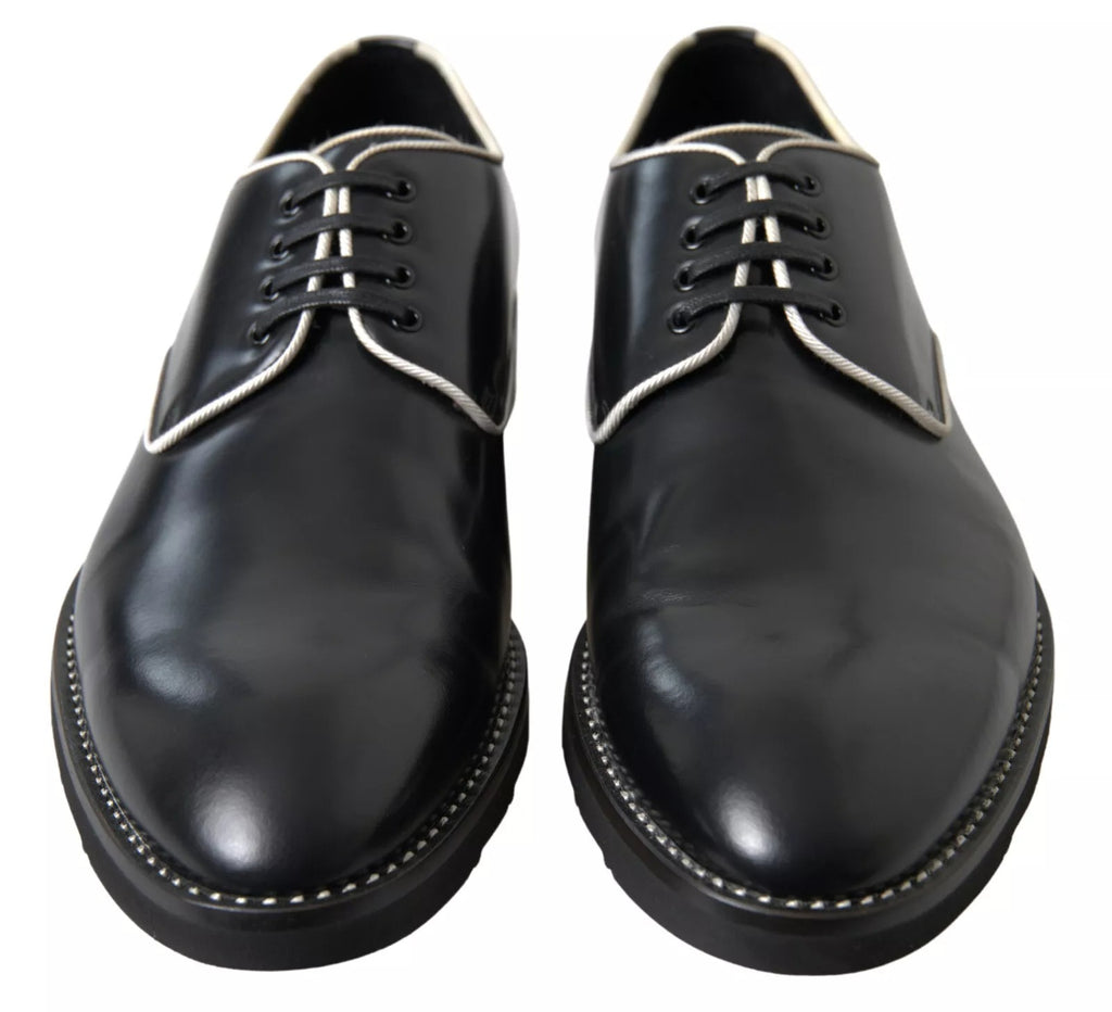 Chaussures formelles en cuir noir et blanc de Dolce & Gabbana, élégantes et sophistiquées pour occasion spéciale.