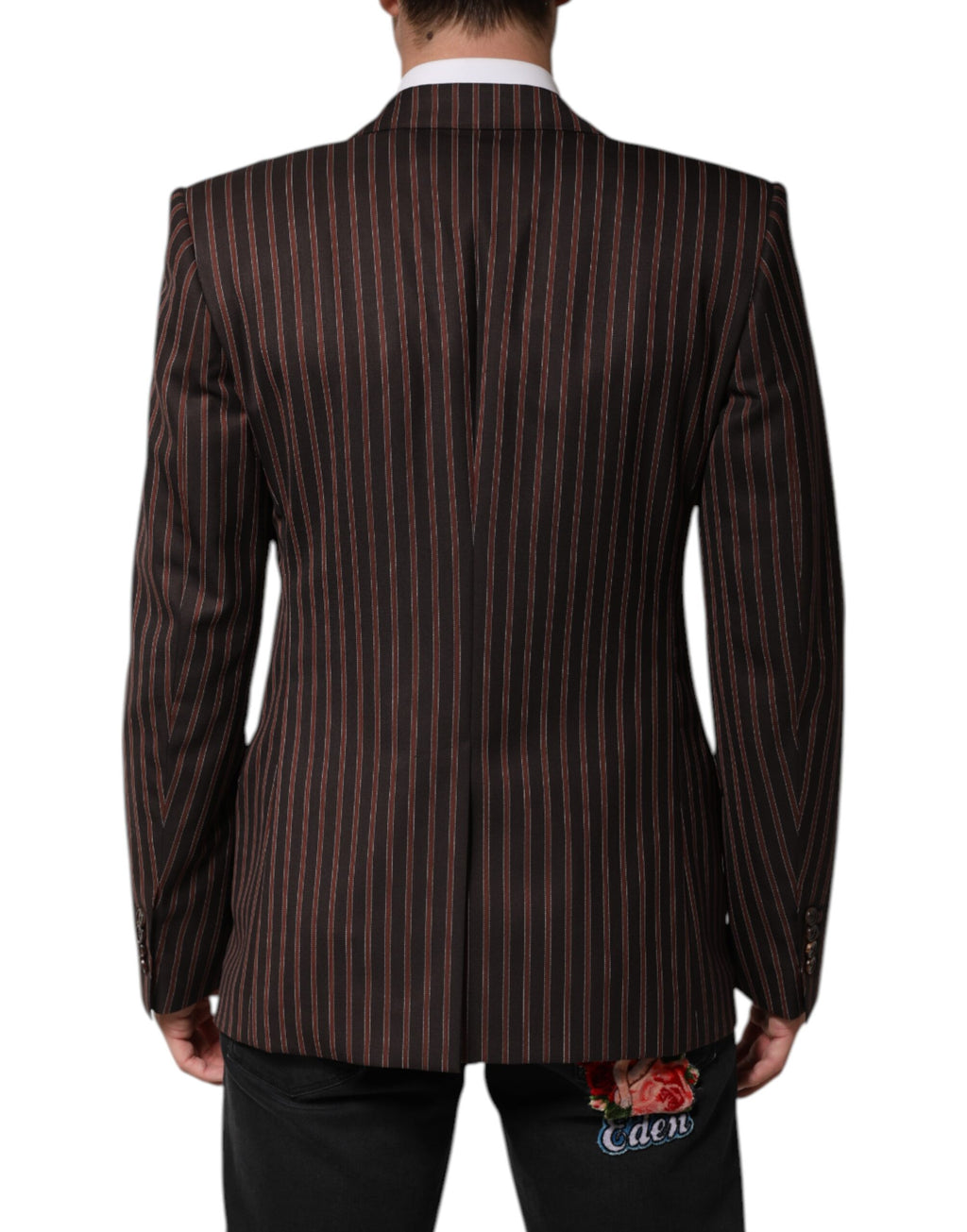 Veste blazer Dolce & Gabbana à rayures noires et marron, single-breasted, tissu élégant, portée masculine.