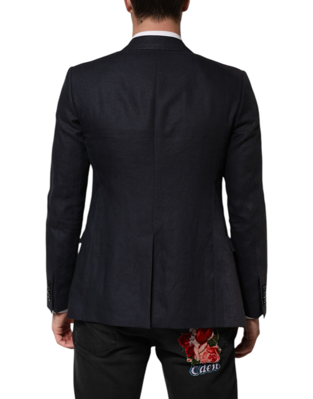 Costume homme Dolce & Gabbana blazer bleu foncé à un bouton, coupe classique et élégante, visible en détail sur l’image.