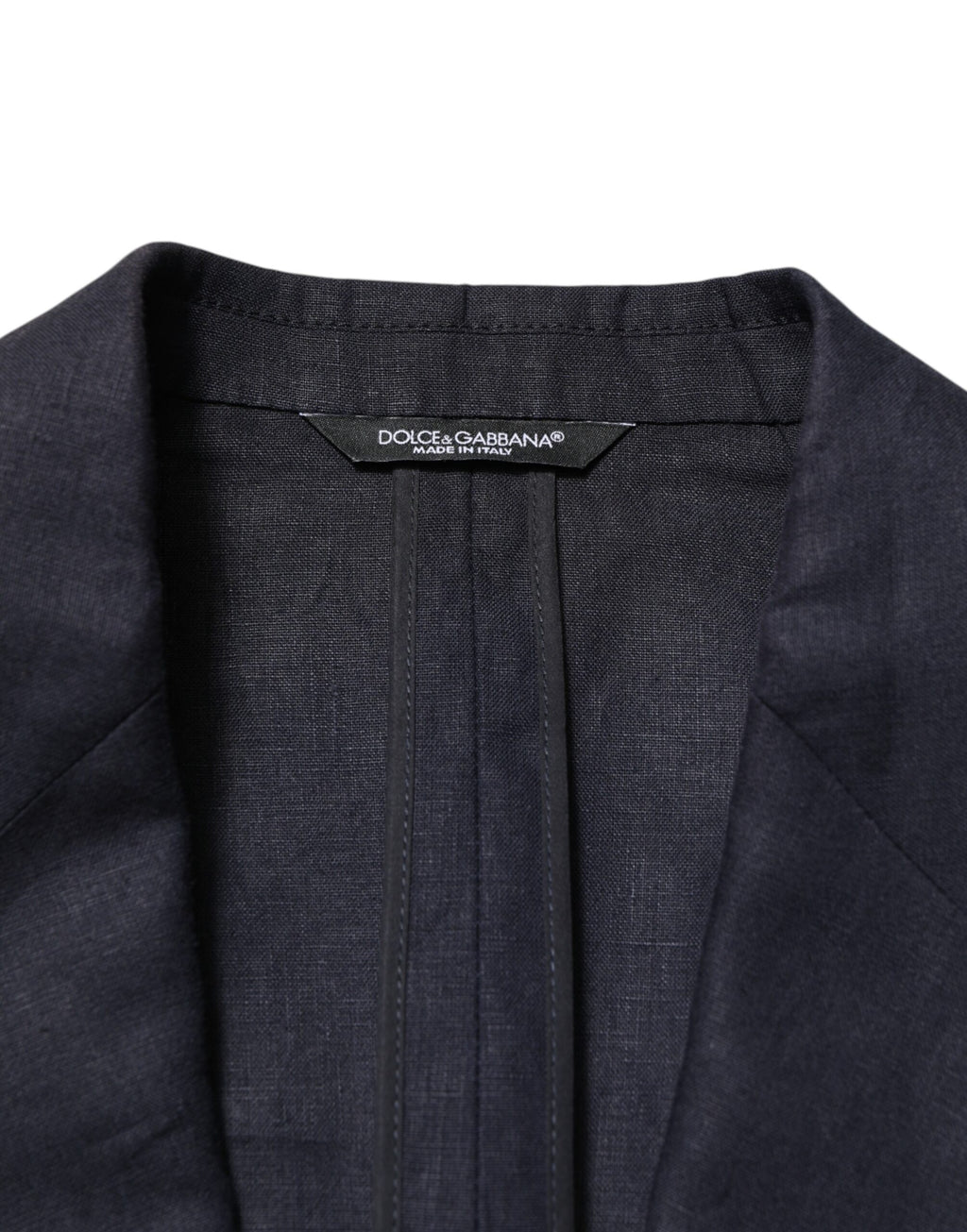Costume homme Dolce & Gabbana blazer bleu marine à un bouton, coupe classique, détails élégants et tissu de qualité.