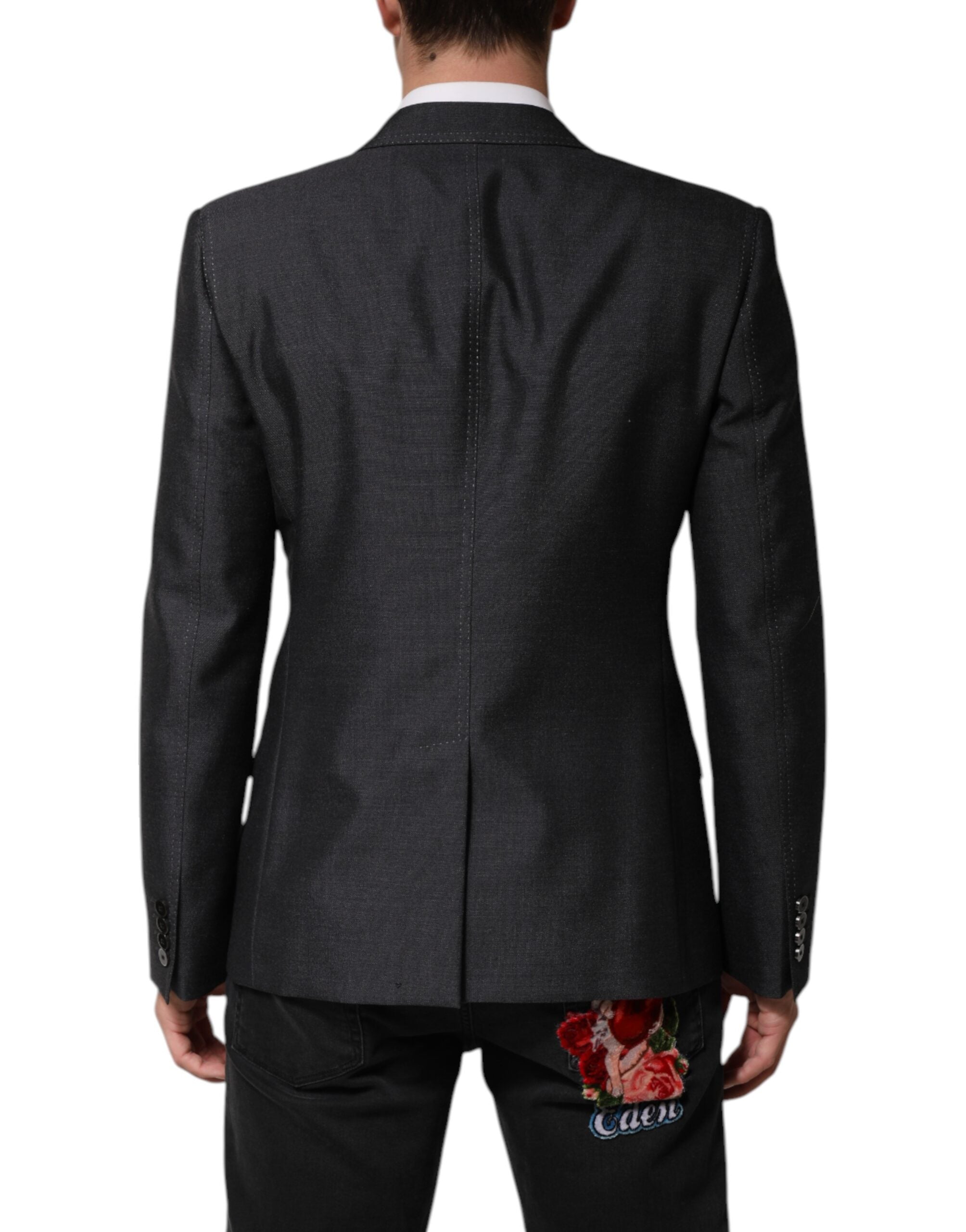 Manteau blazer en laine gris foncé Dolce & Gabbana avec broderie abeille élégante, porté sur un mannequin.