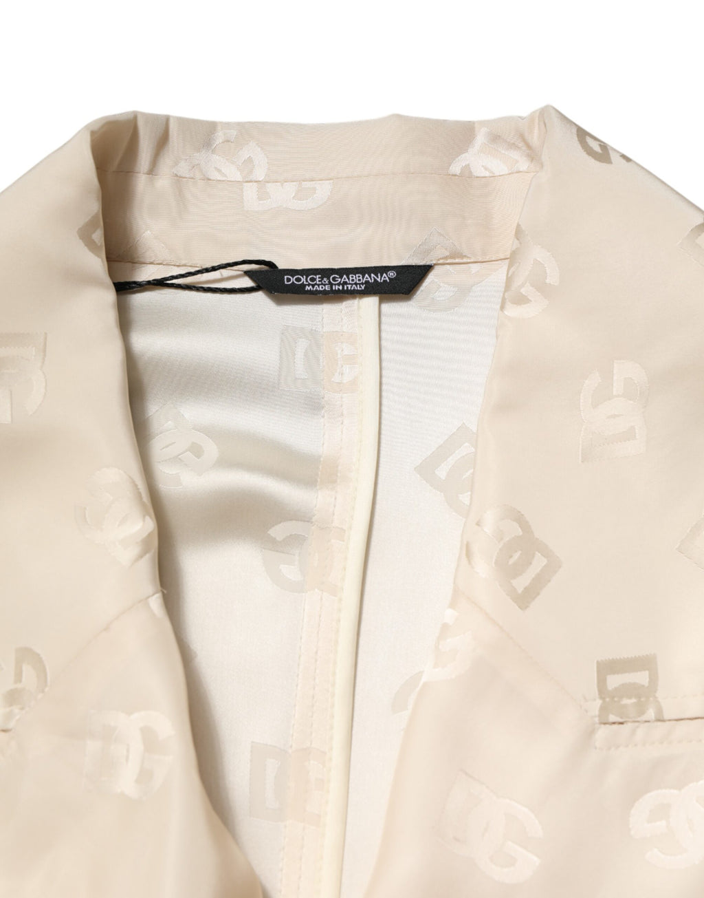 Manteau beige en polyester avec logo monogramme Dolce & Gabbana, veste élégante et sophistiquée.