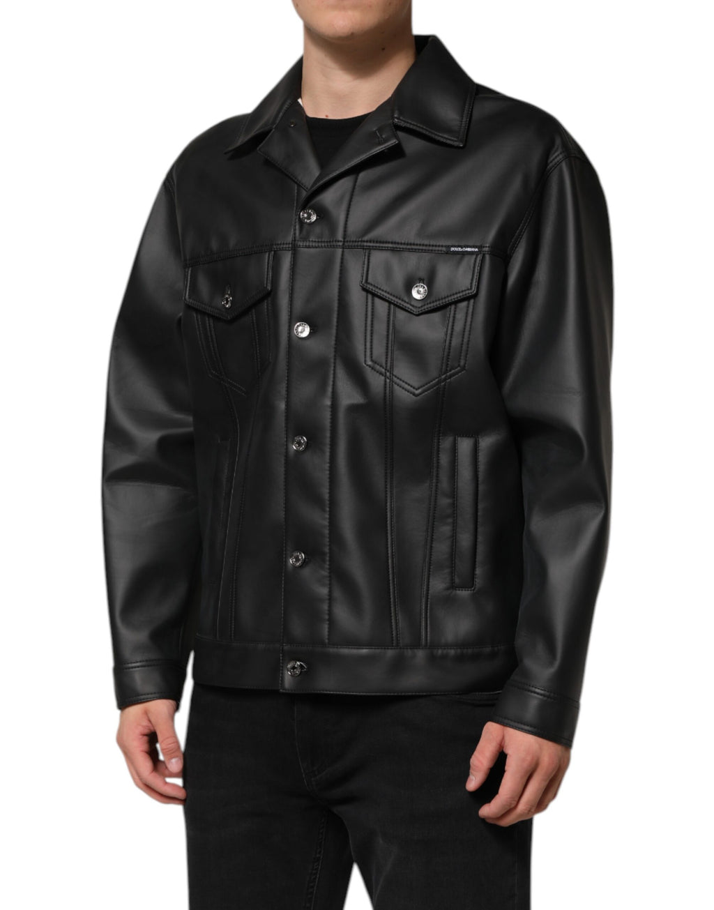 Veste en polyester noir Dolce & Gabbana à boutons avec style biker, ajustée et tendance, vue de face.