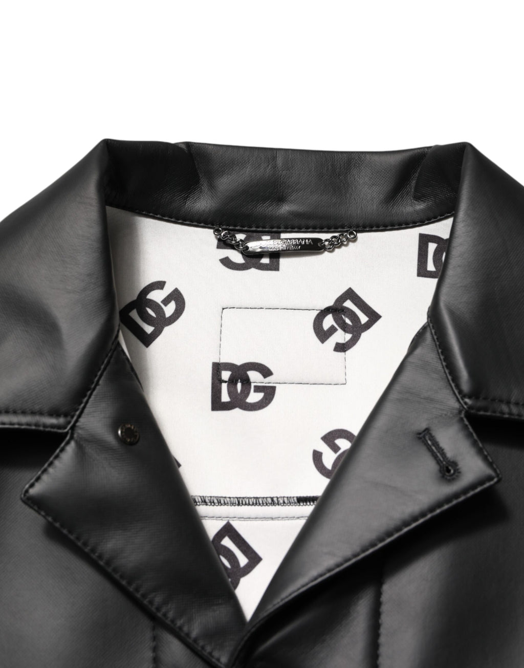 Veste biker noire en polyester Dolce & Gabbana avec boutons, style élégant et moderne, vue de face.