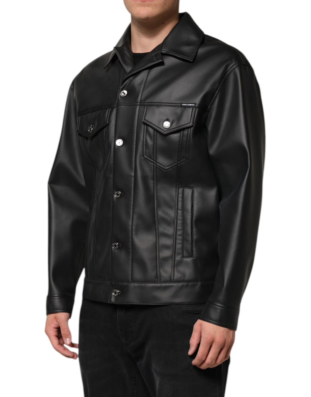 Veste biker noire en polyester Dolce & Gabbana avec boutons, style élégant et moderne, vue de face sur un fond neutre.