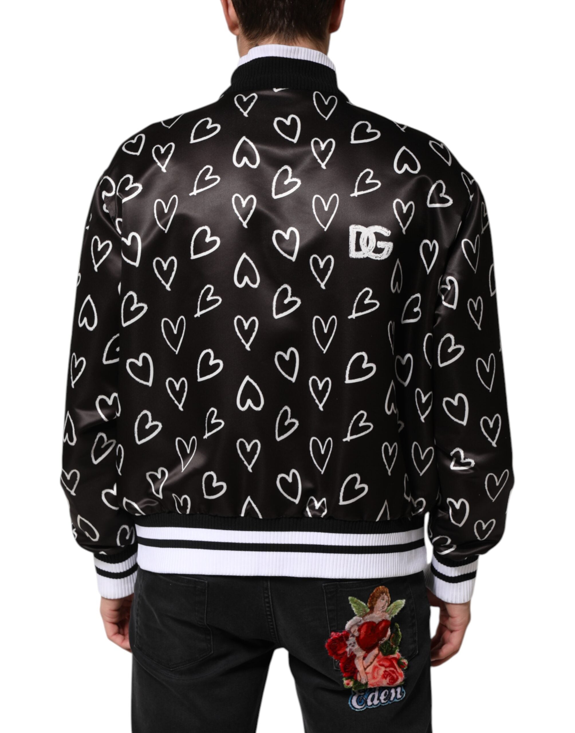 Veste bomber en polyester noir Dolce & Gabbana avec imprimé cœur rouge et blanc, coupe ajustée et détails modernes.