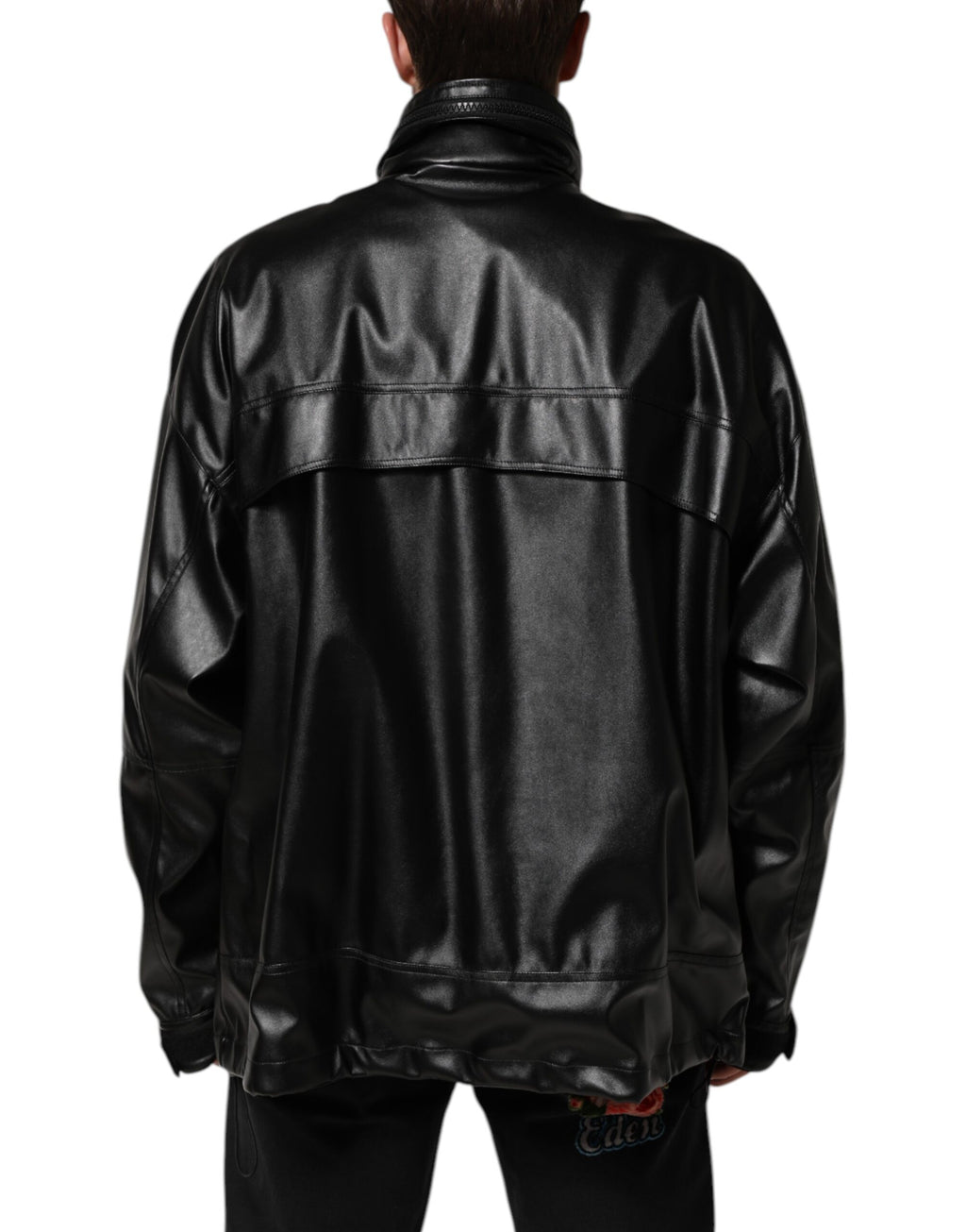 Veste bomber en polyester noir Dolce & Gabbana avec plaque logo, design élégant et moderne, vue de face.