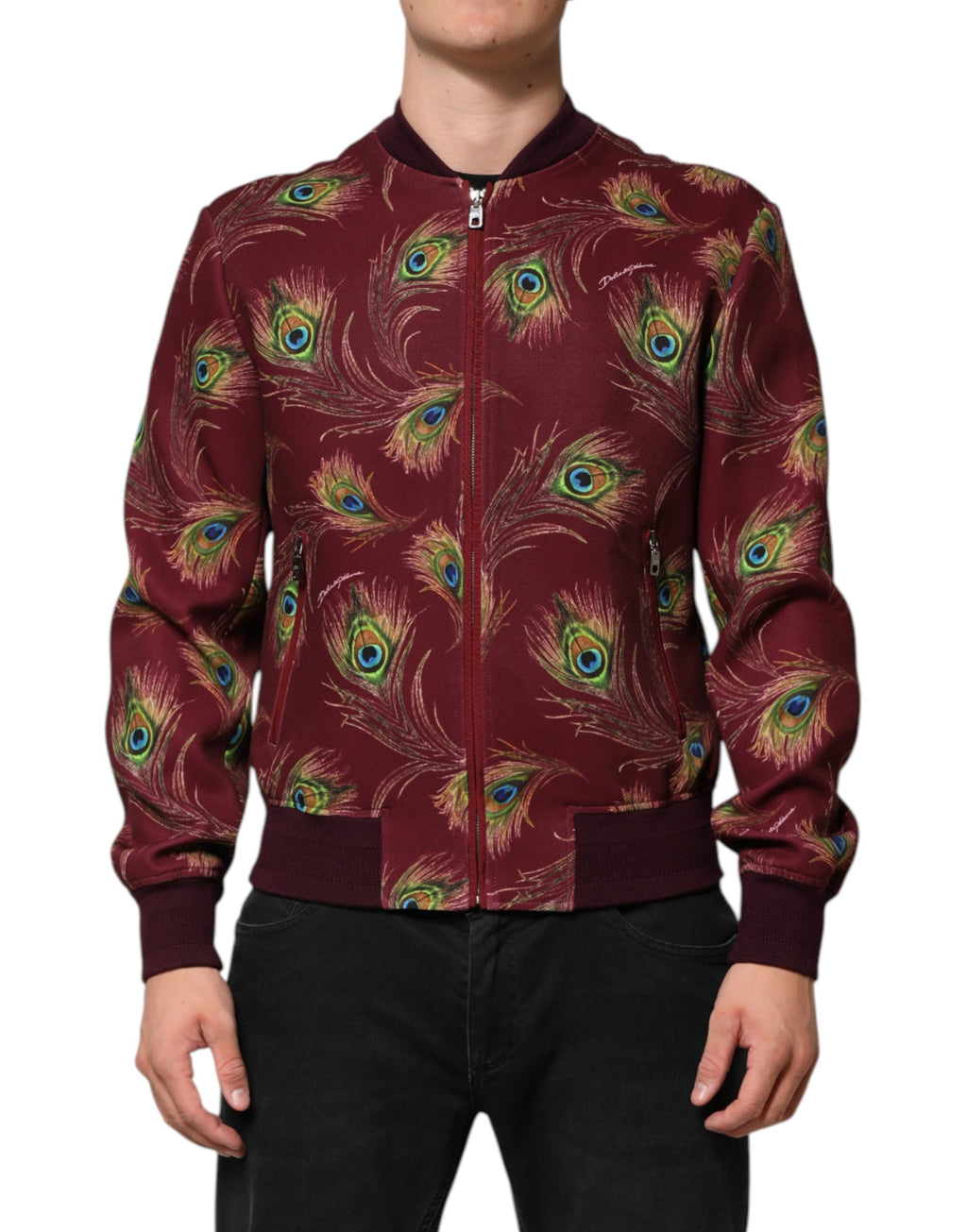 Veste bomber pour femme de Dolce & Gabbana avec imprimé plumes de paon marron et détails élégants.