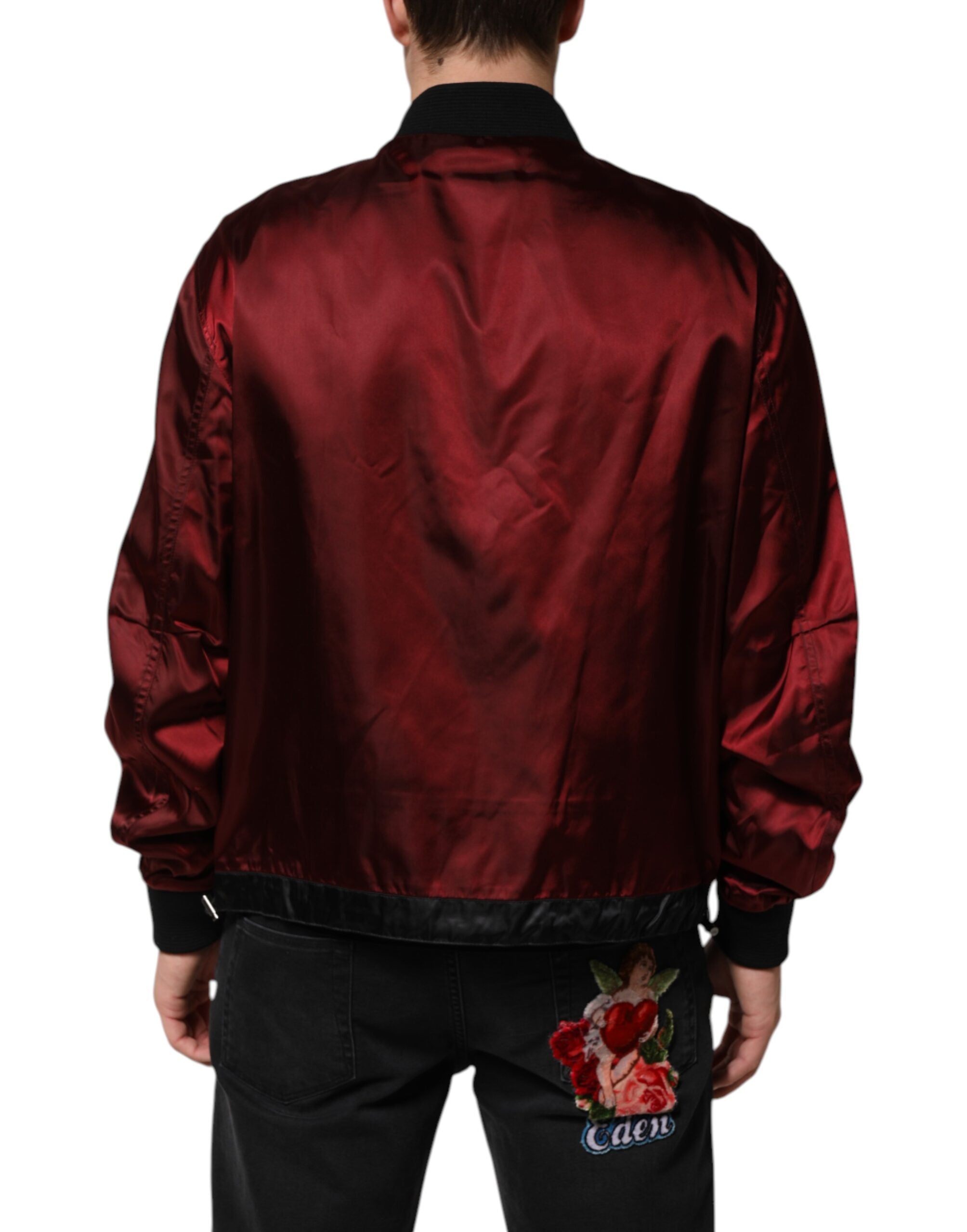 Veste en nylon bordeaux Dolce & Gabbana avec broderie DG Crown, style élégant et détails sophistiqués.
