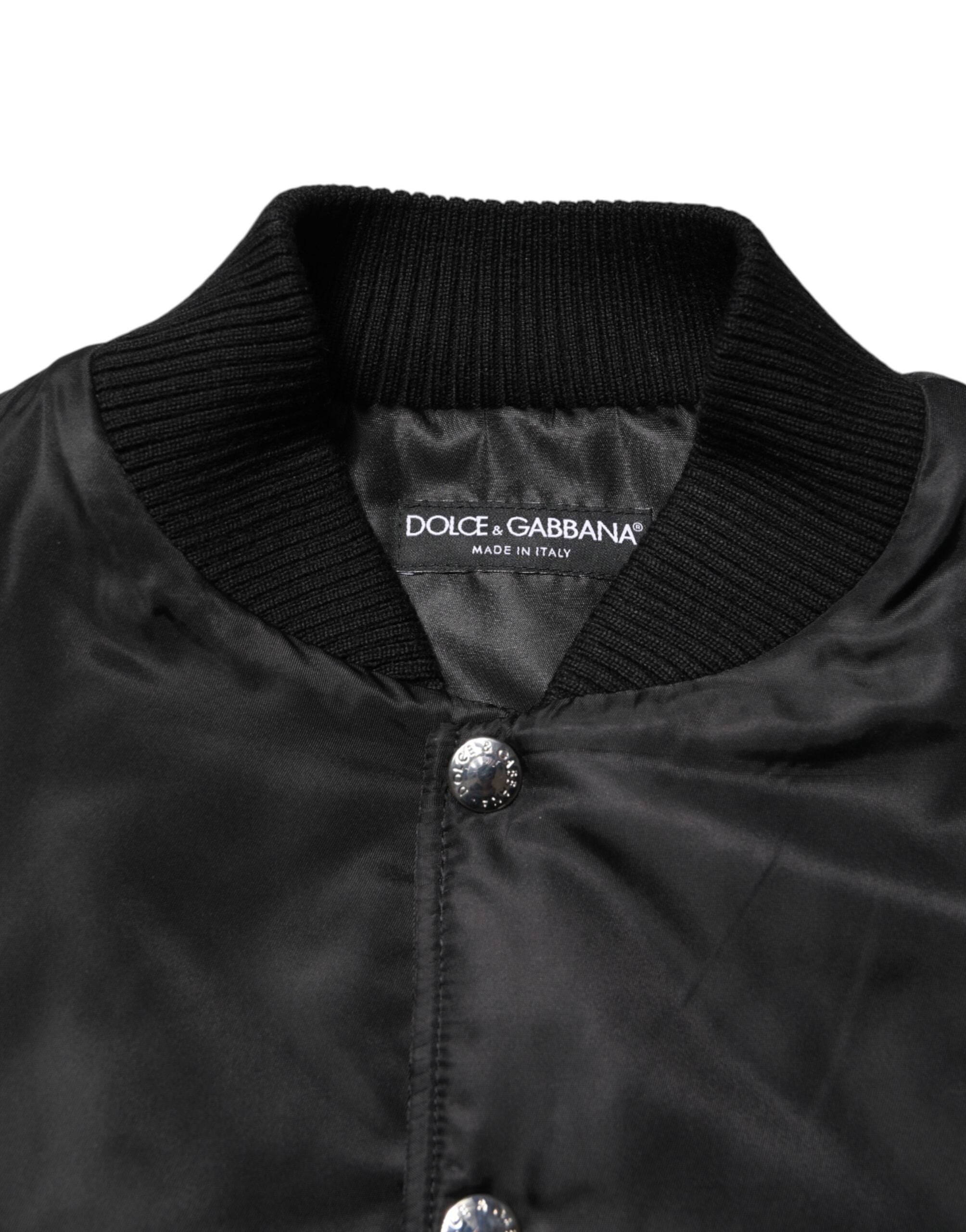 Veste bomber noire en polyester Dolce & Gabbana avec plaque logo, détails modernes et style élégant.
