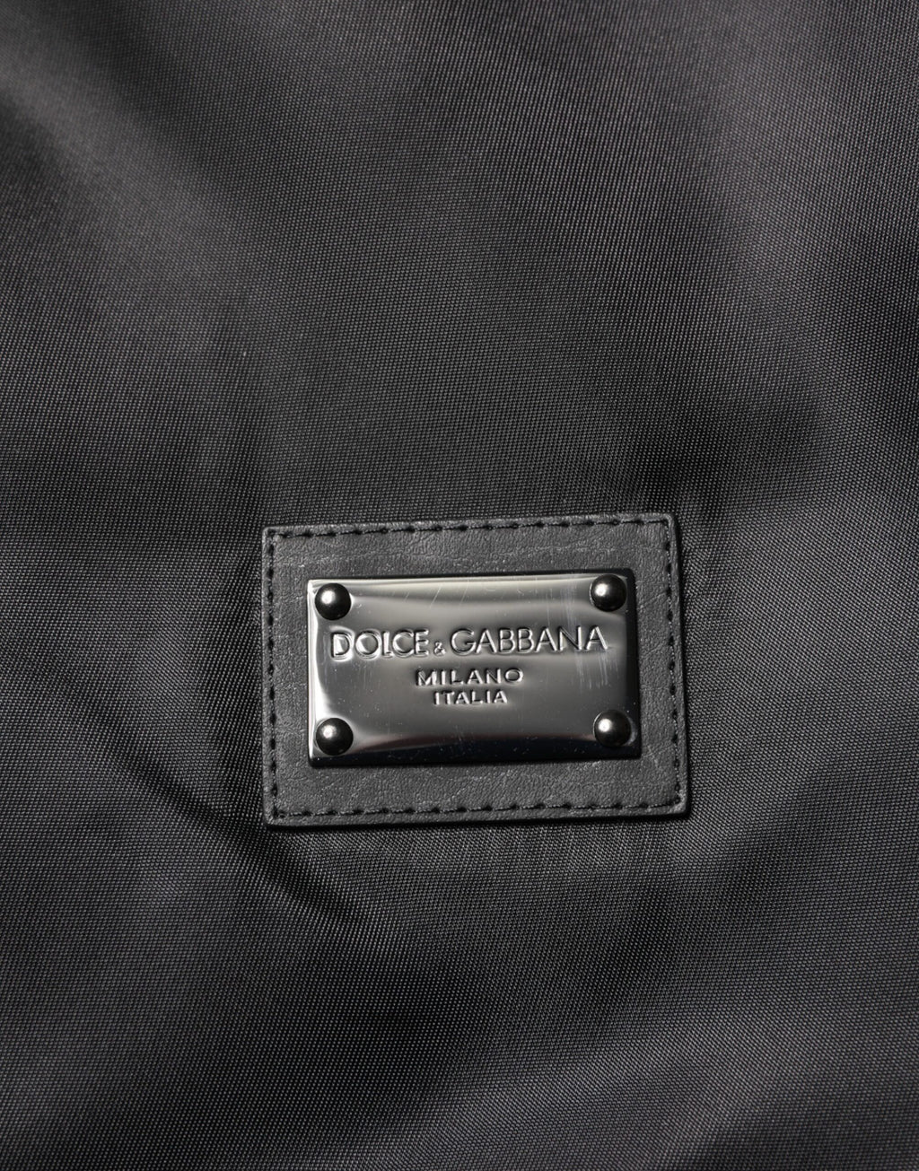 Veste bomber en polyester noir Dolce & Gabbana avec plaque logo, manches longues et coupe moderne.