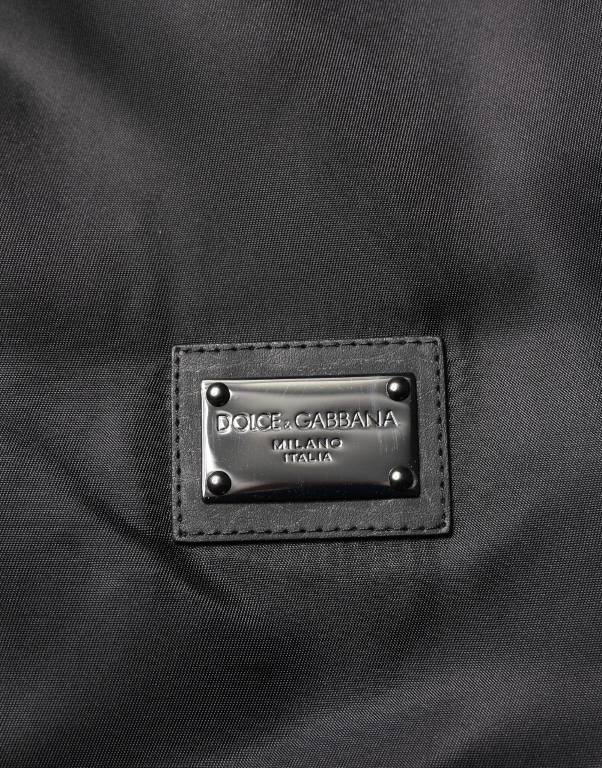 Veste bomber en polyester noir Dolce & Gabbana avec plaque logo, manches longues et coupe moderne.
