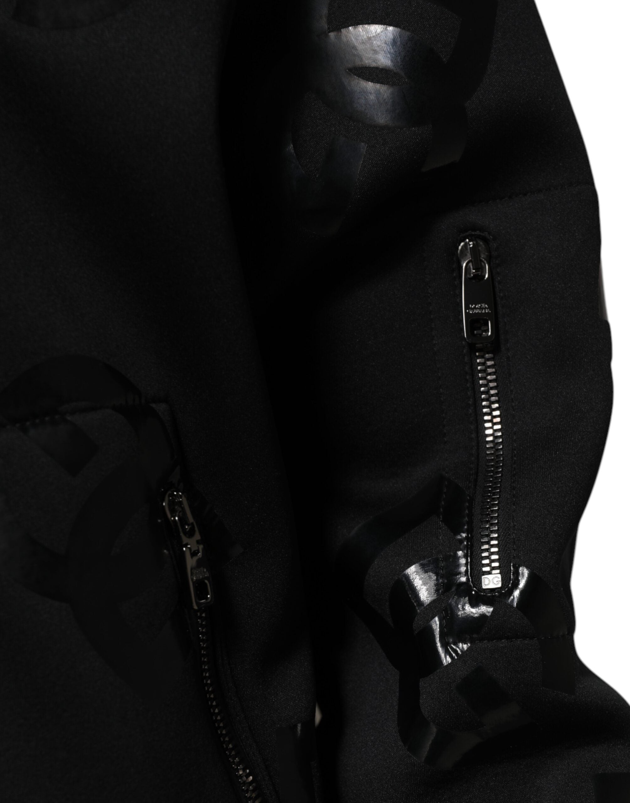 Veste bomber pour homme Dolce & Gabbana en laine noire avec logo DG Mania visible, style élégant et moderne.