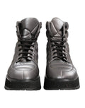 Bottes en cuir argenté Dolce & Gabbana, mi-mollet, à lacets, doublées et padding, chaussures élégantes et confortables.