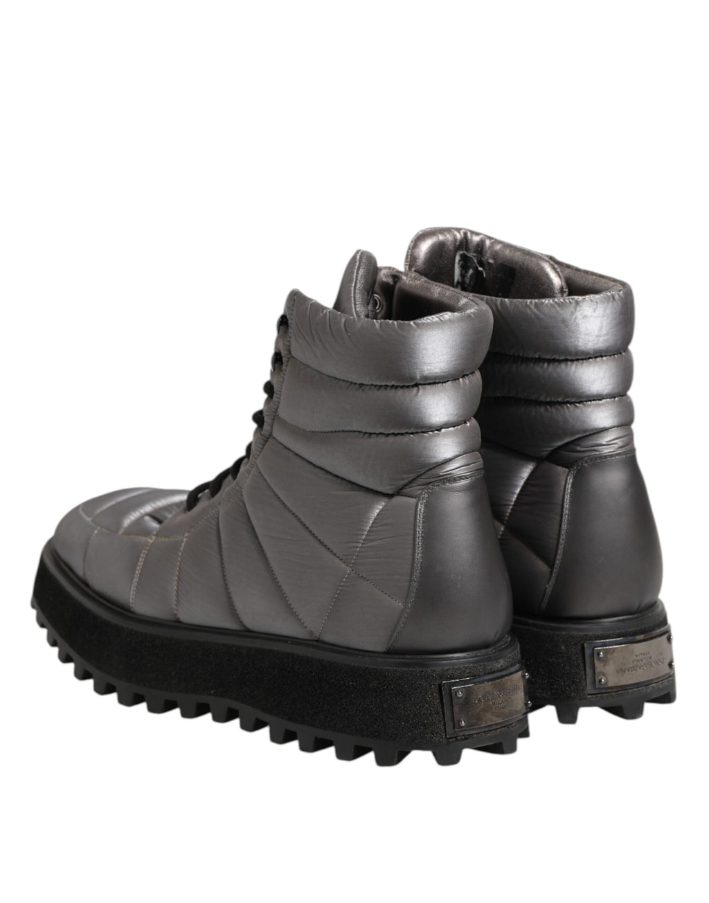 Bottes en cuir argenté Dolce & Gabbana mi-mollet, lacets, rembourrées et élégantes, pour un style sophistiqué.