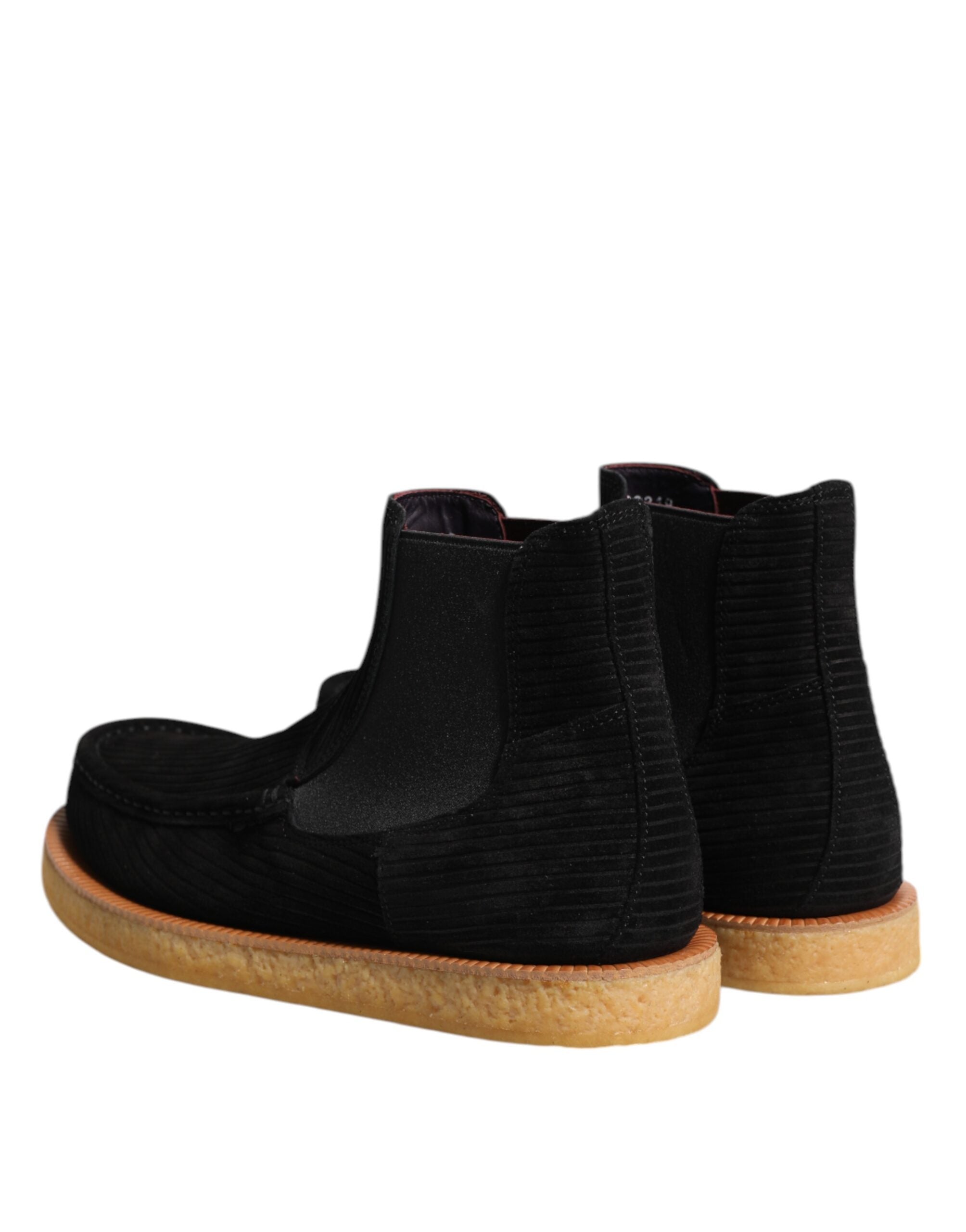 Bottes ankle en daim noir Dolce & Gabbana pour femmes, style slip-on, avec design élégant et finition soignée.